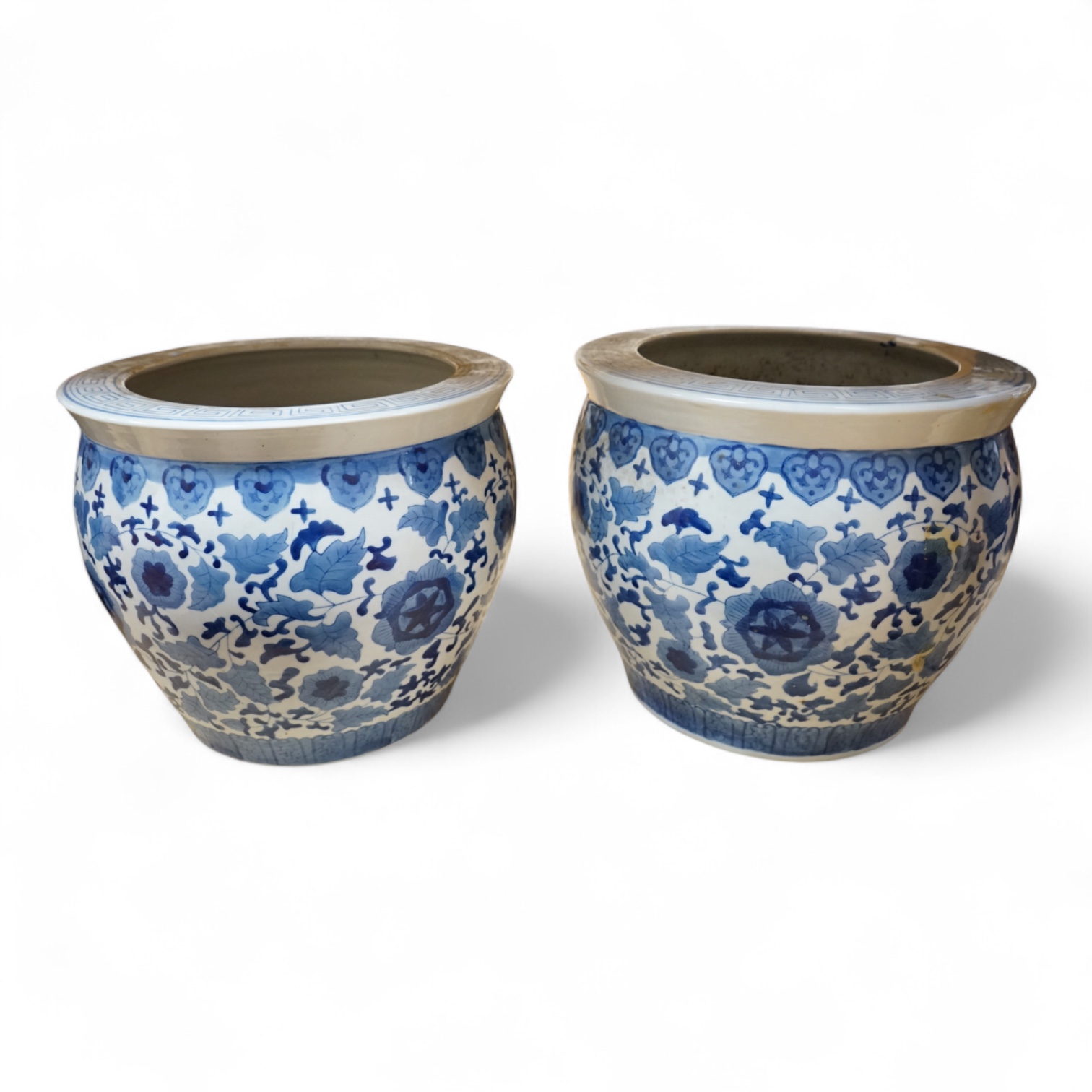A pair of Chinese blue and white jardinieres, 30cm high